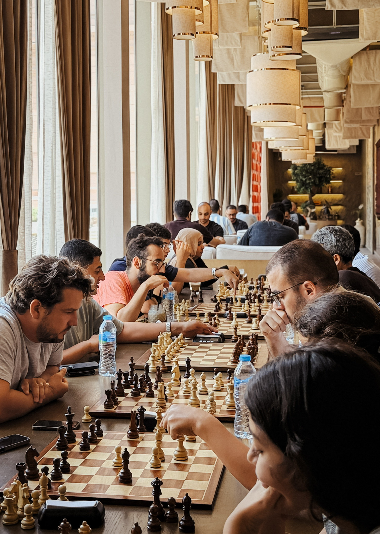 A full table of players at X Chess Club