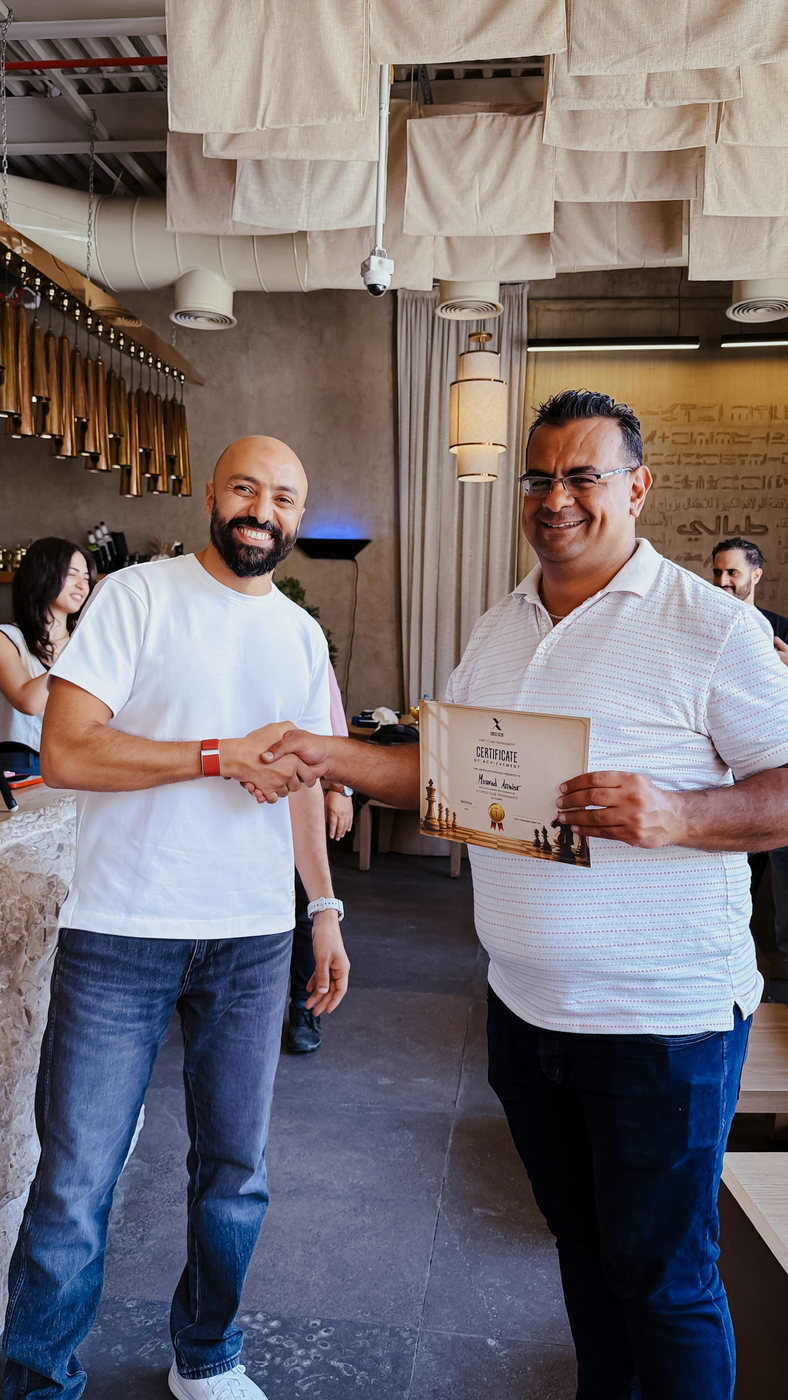 Handing over a certificate at the rapid tournament